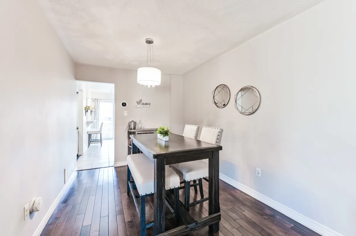 Functional kitchen and dining nook at 133 Howard Crescent, ideal for morning coffee and casual family dining.