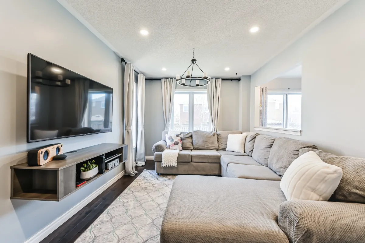 Detailed view of the family room at 133 Howard Crescent, showcasing the sophisticated main level living space.