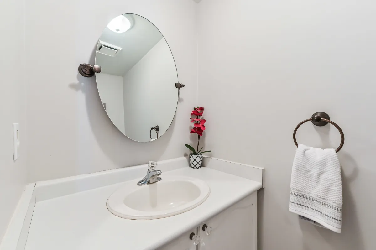 Detail of the basement bathroom area at 133 Howard Crescent, highlighting future in-law suite potential.