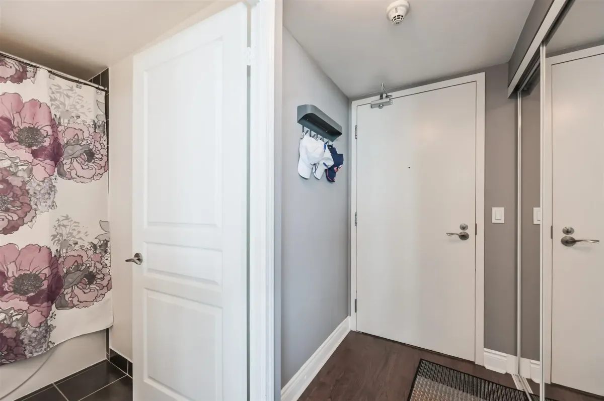 bright hallway from entrance of the unit to the bathroom