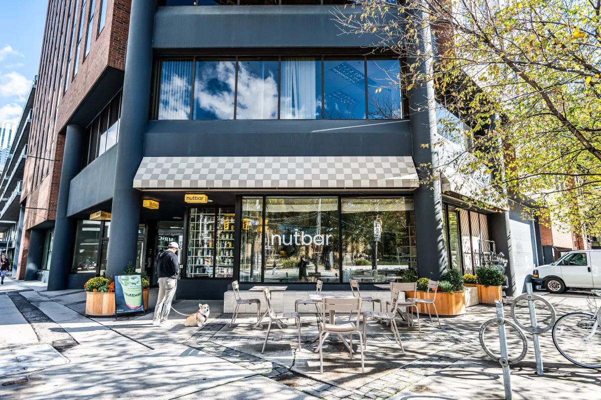 Nutbar at the corner of Quad Lofts at 23 Brant St