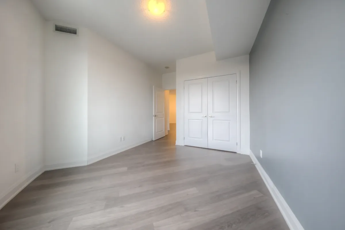 Bright bedroom with double closet doors