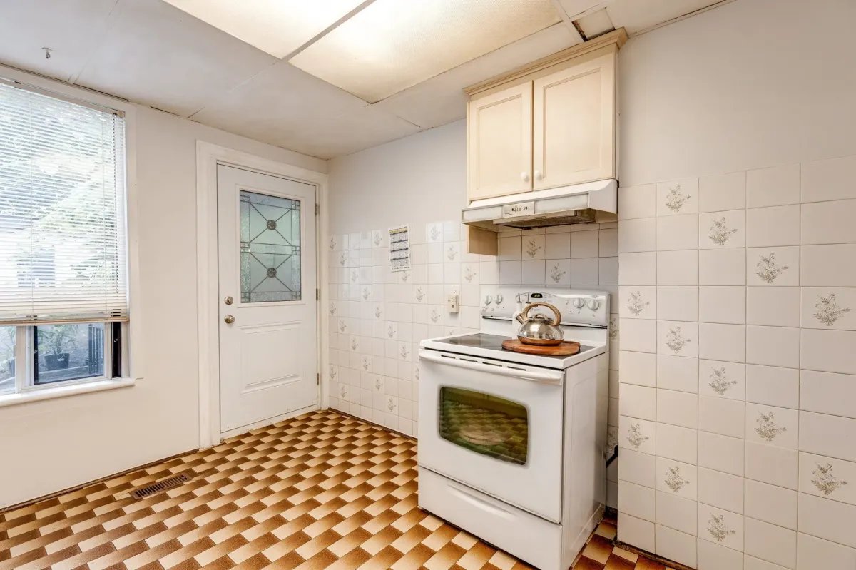 Side view of kitchen and stove at 56 Hickson St.