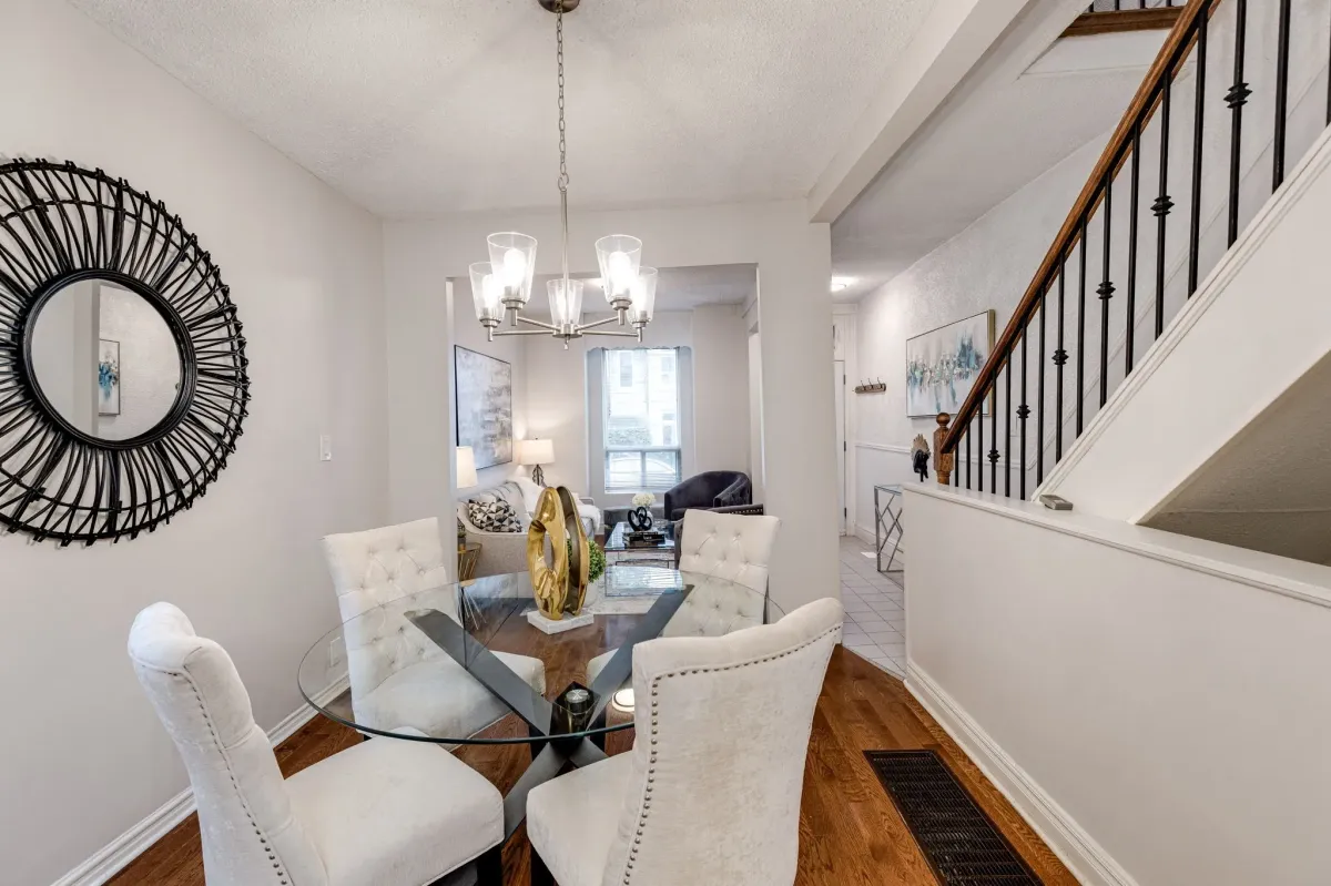 Open concept dining table looking at living room in 56 Hickson St