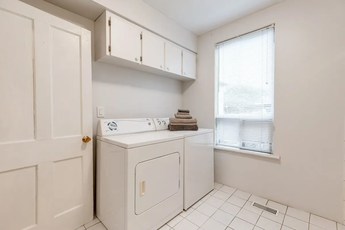 Washer and dryer set in bathroom