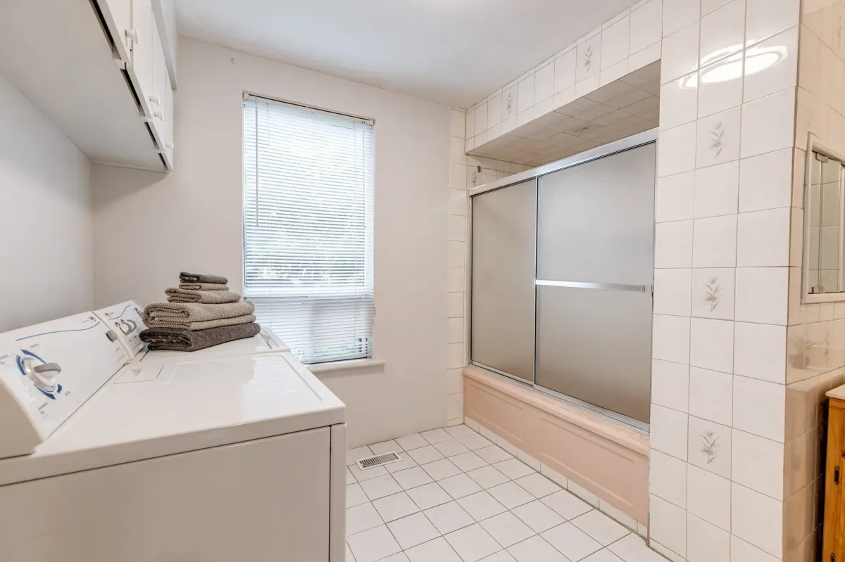 Large bathroom with laundry at 56 Hickson St.