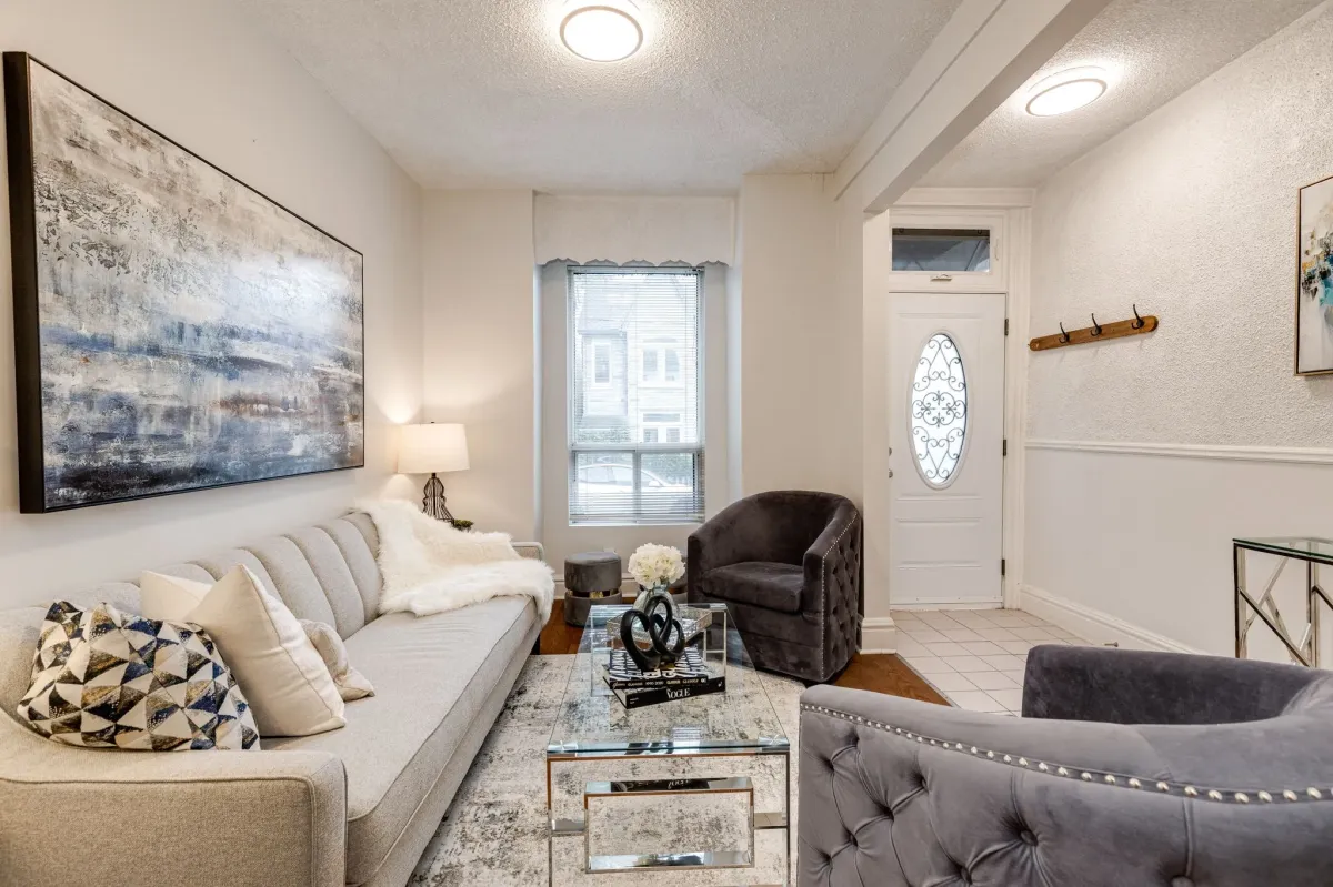 Living room with window and main entrance