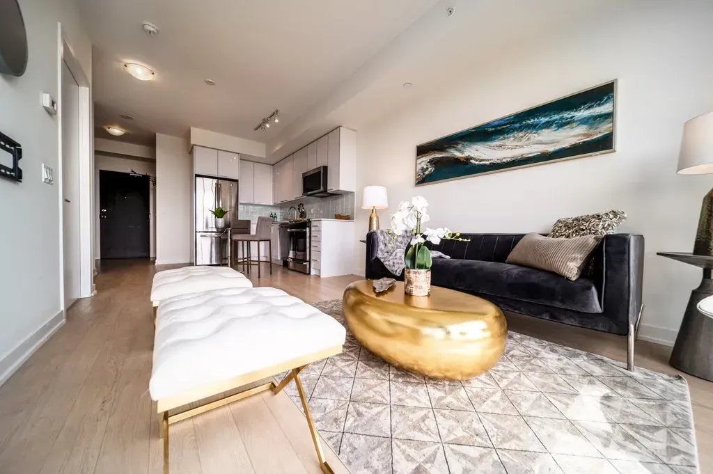 Wide shot showing the seamless flow between the living and kitchen areas at 10 Park Lawn Rd, Unit 3402.