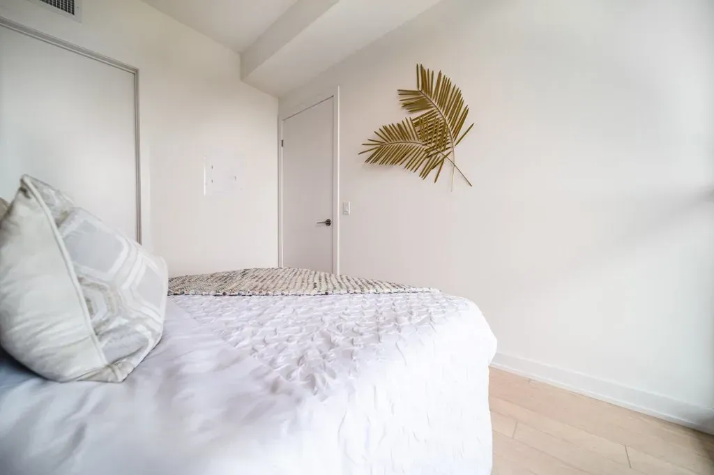 View of the clean lines and minimalist gold wall decor inside 10 Park Lawn Rd, Unit 3402.