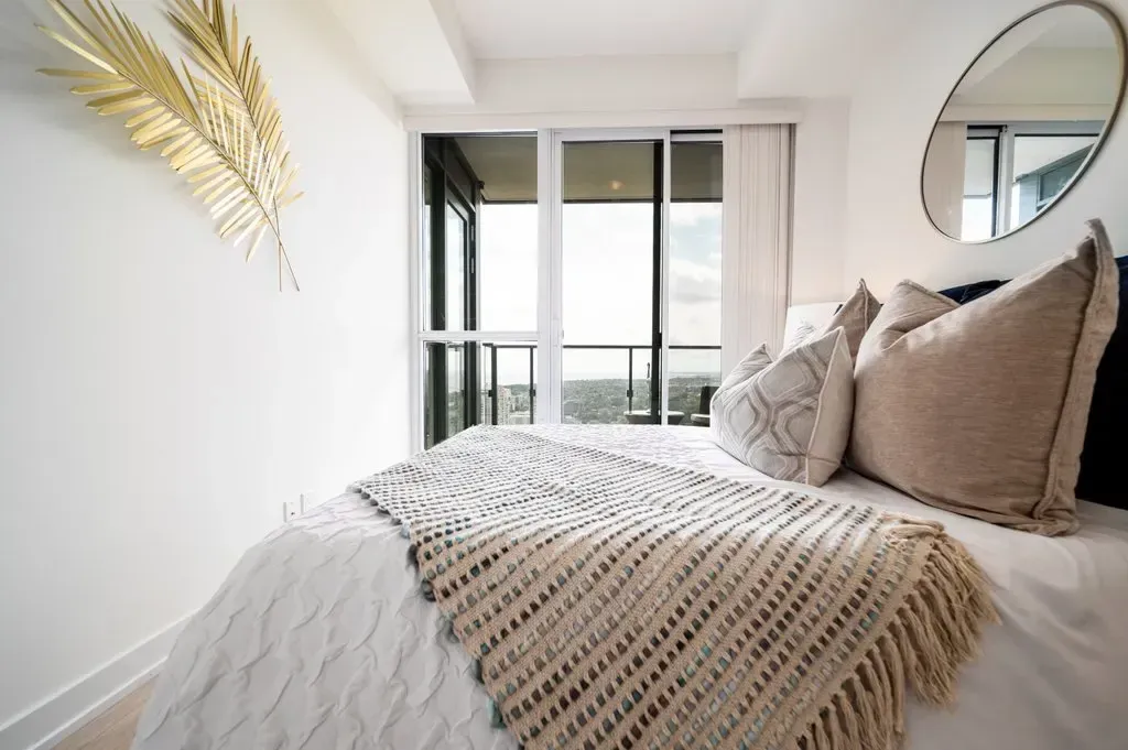 Perspective shot of the 10 Park Lawn Rd, Unit 3402 bedroom highlighting the soft textures.