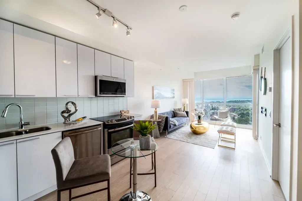 View showing the proximity of the kitchen to the balcony entrance in 10 Park Lawn Rd, Unit 3402.