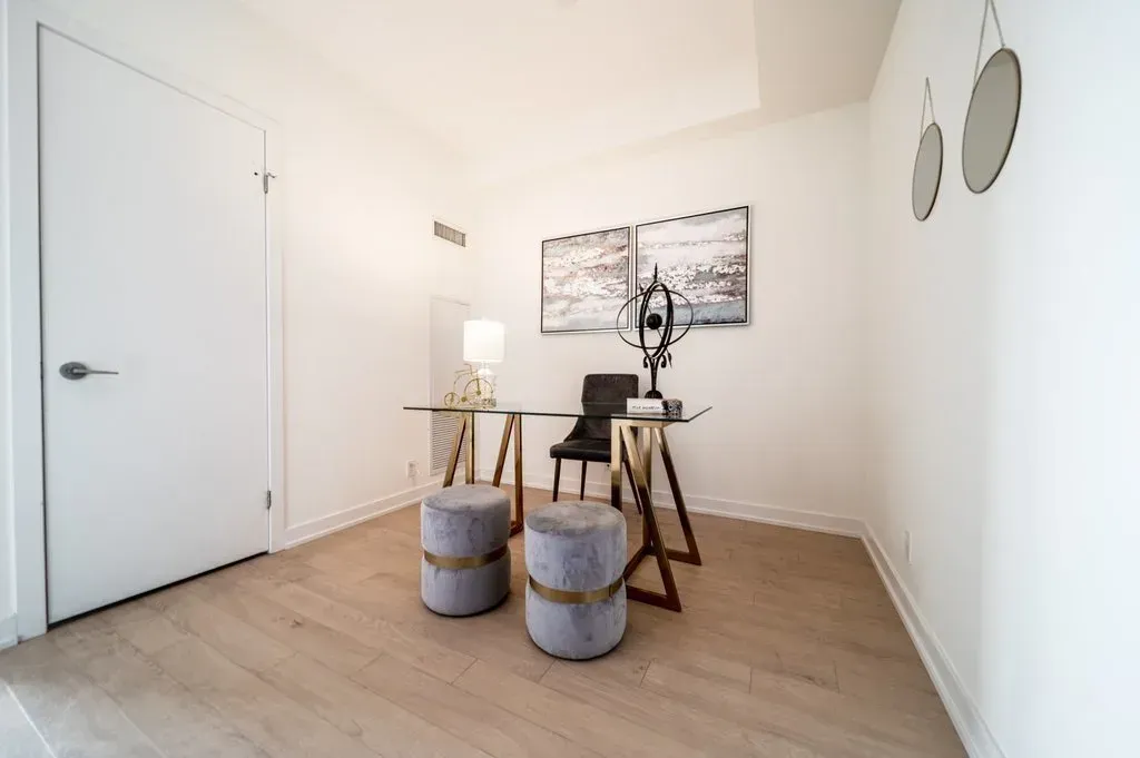Dedicated home office/den space at 10 Park Lawn Rd, Unit 3402 with a glass desk.