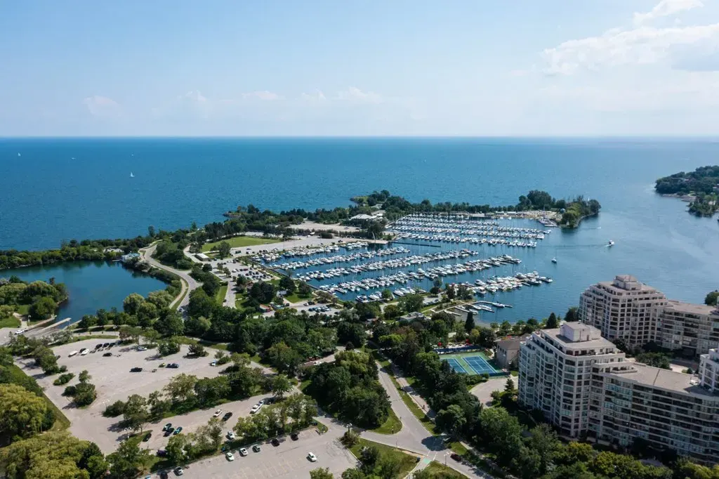 Panoramic aerial view of the boat slips and shoreline near 10 Park Lawn Rd, Unit 3402.