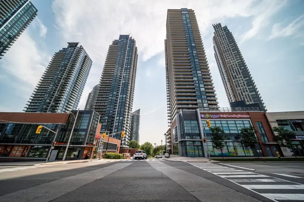 Modern streetscape at 10 Park Lawn Rd, Unit 3402 with retail shops and Westlake Village steps away.