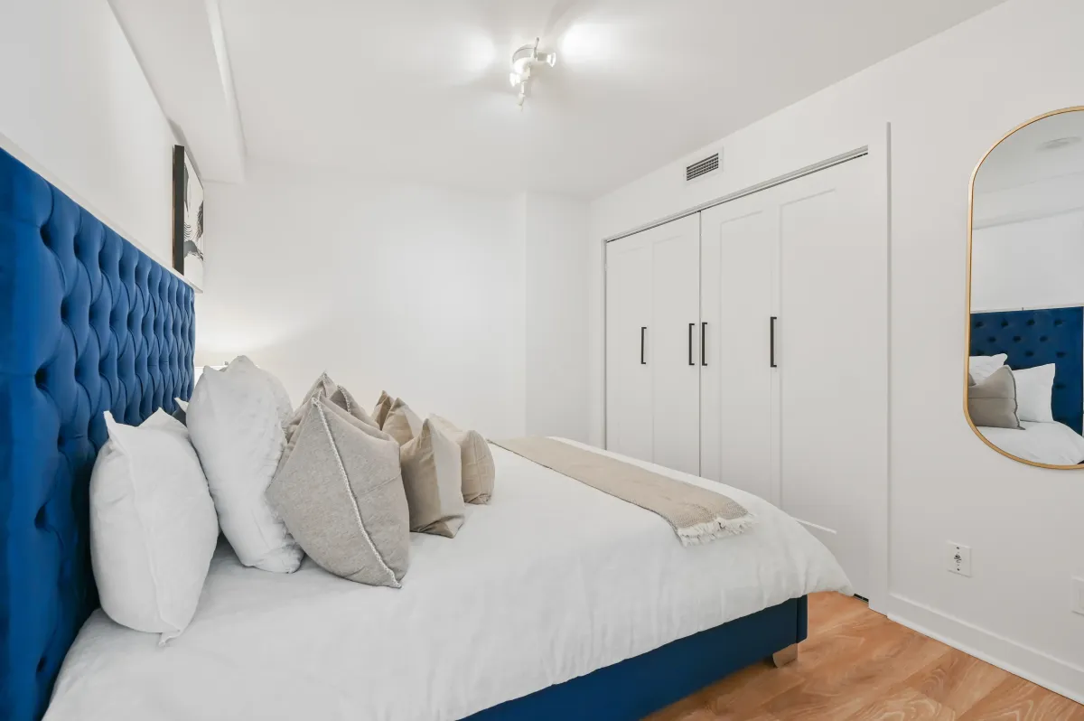 Bright and airy primary suite at 100 Western Battery Rd, Unit 1911 with neutral decor and clean lines.