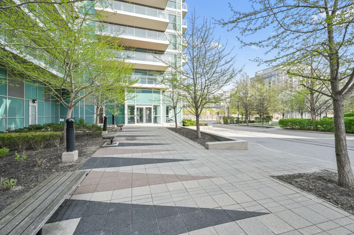 Professional landscaping and pedestrian walkways at 100 Western Battery Rd, Unit 1911.
