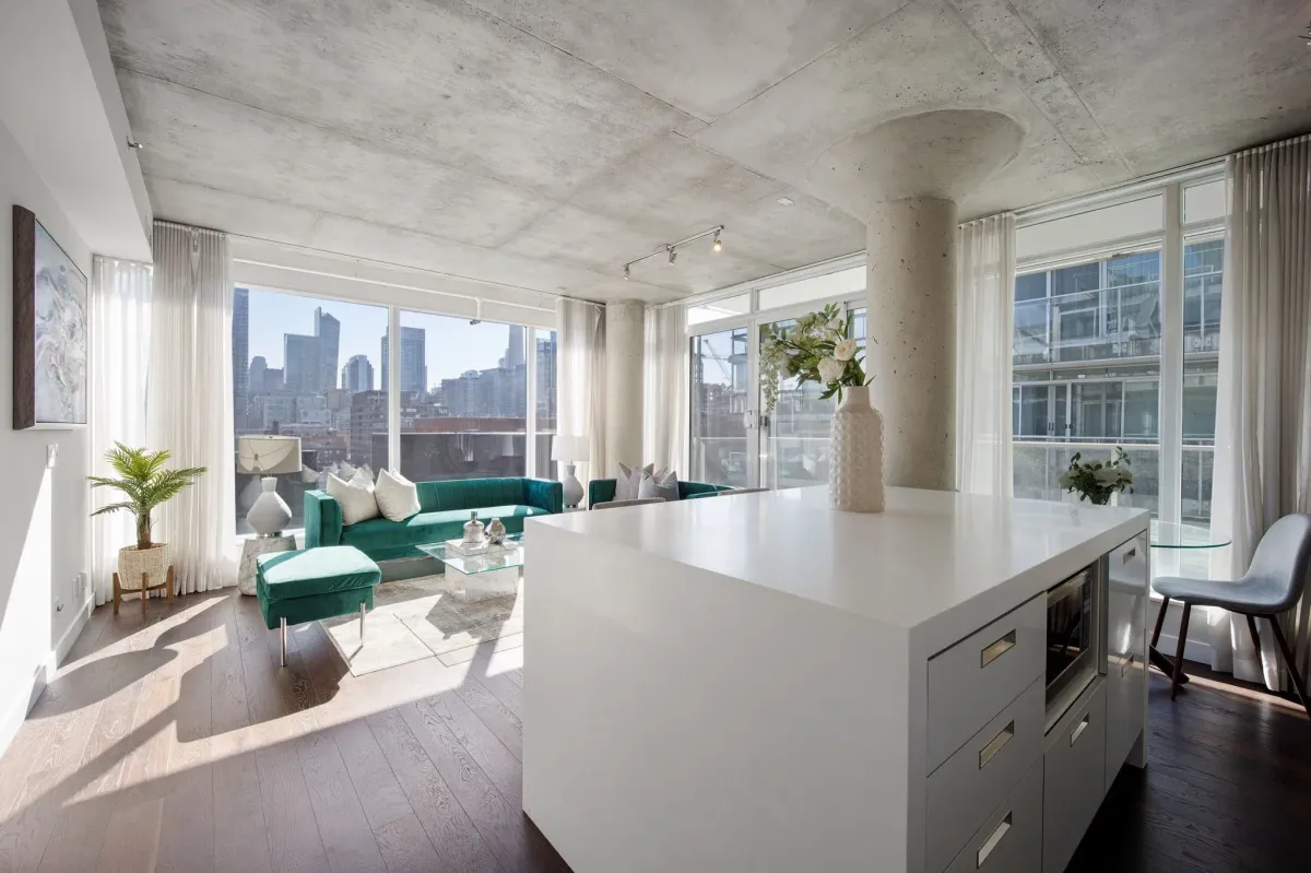 Spacious kitchen island and breakfast bar at 75 Portland St #807, ideal for entertaining in this luxury King West loft.
