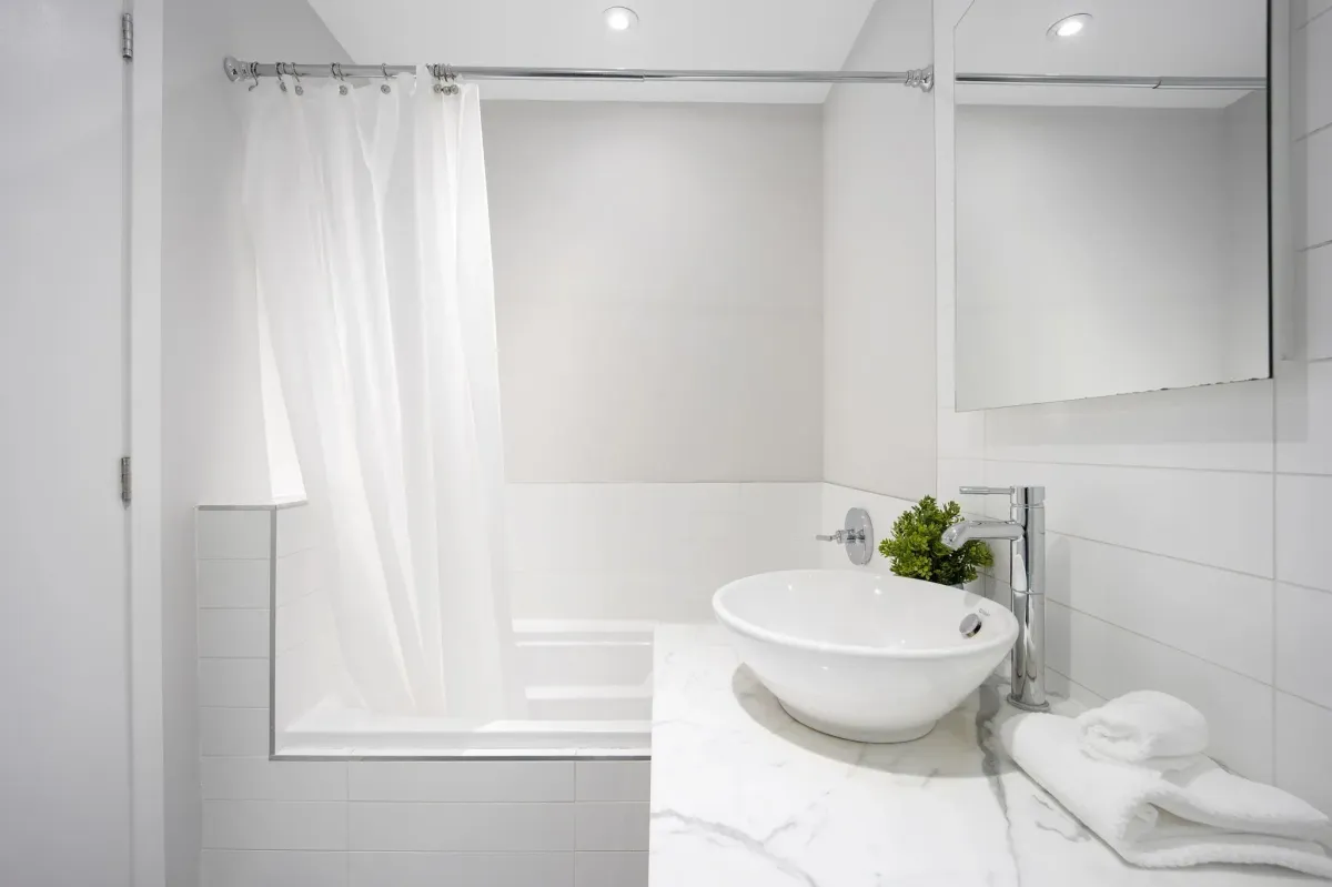 Sleek vanity and bathroom detail at 75 Portland St #807, reflecting the high-end finishes of Seventy5 Portland.