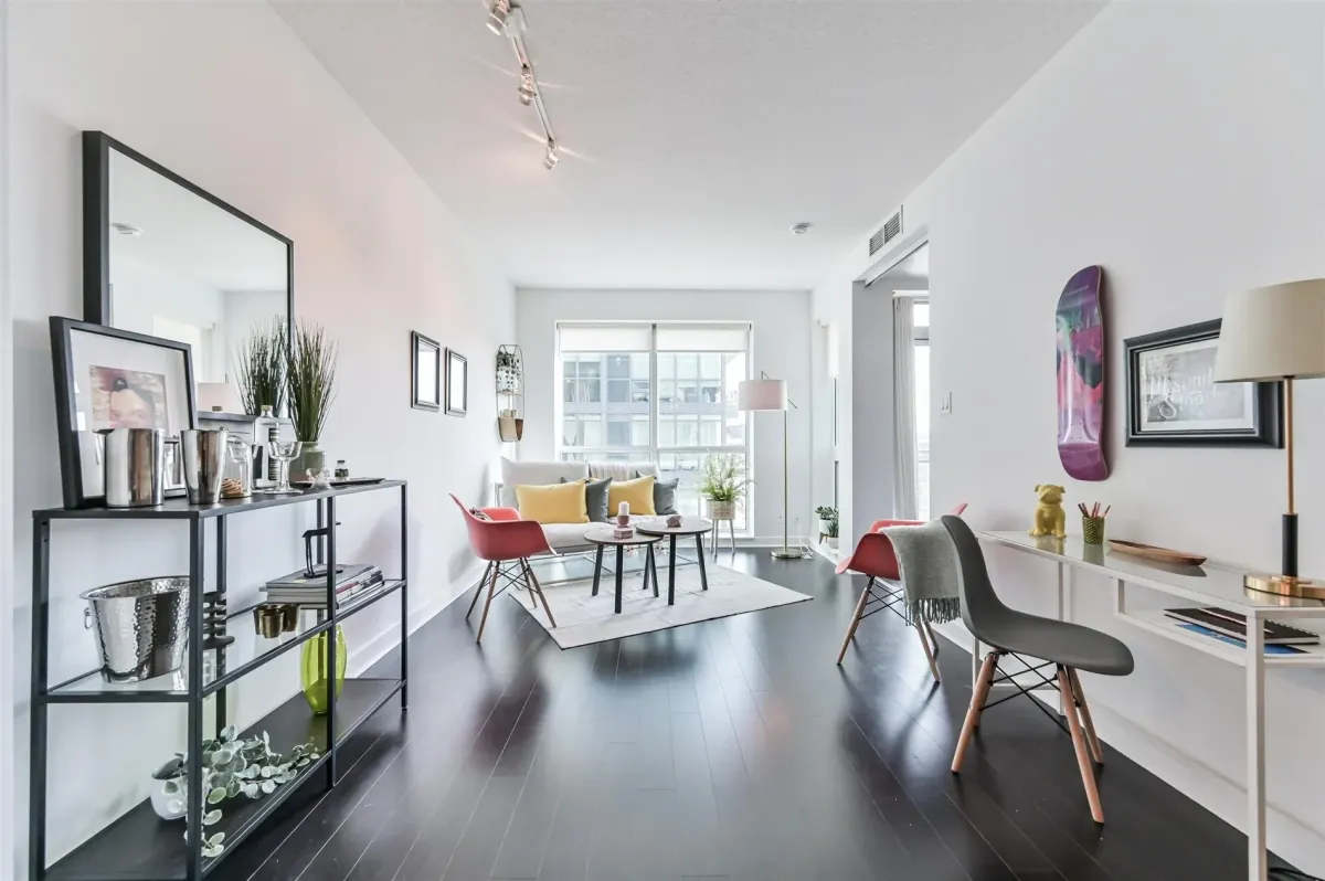 Wide-angle view of the modern chef-inspired kitchen at 1169 Queen St W, Unit N502, in the Bohemian Embassy.