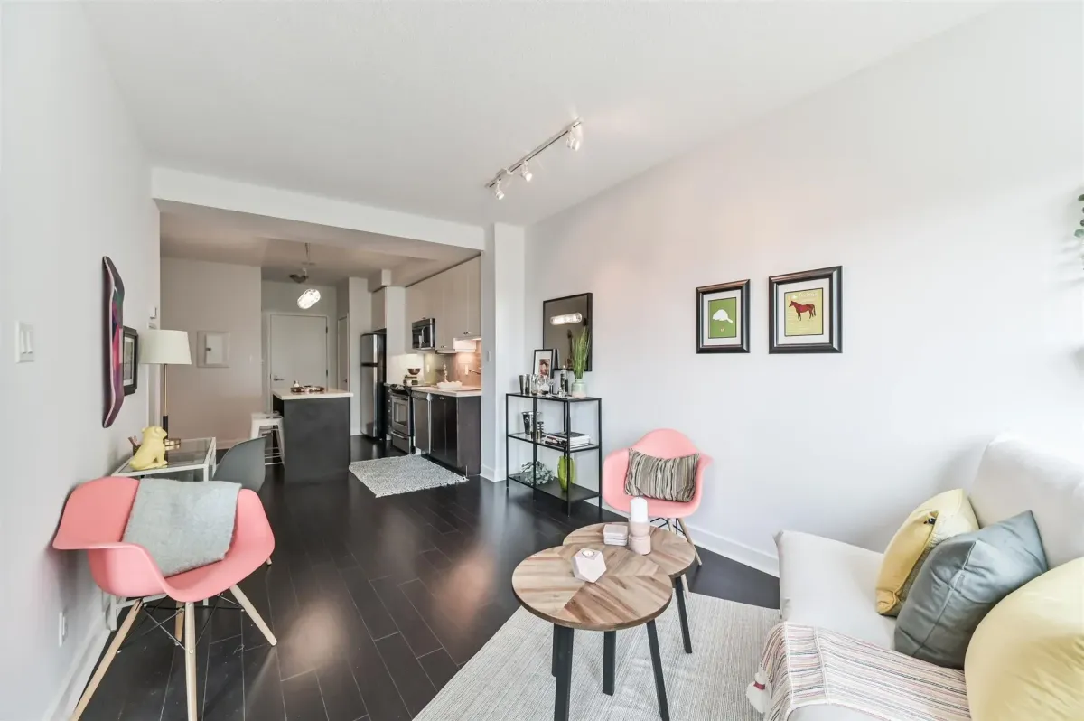 Bohemian-inspired living and dining area in Unit N502, 1169 Queen St W, showcasing urban sophisticated design.