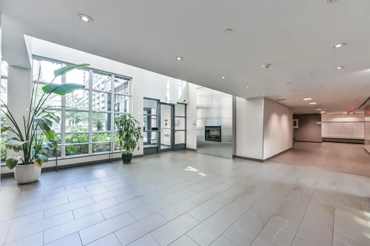 Lush greenspace and trees outside the Bohemian Embassy, near Trinity Bellwoods Park, just steps from 1169 Queen St W, Unit N502.