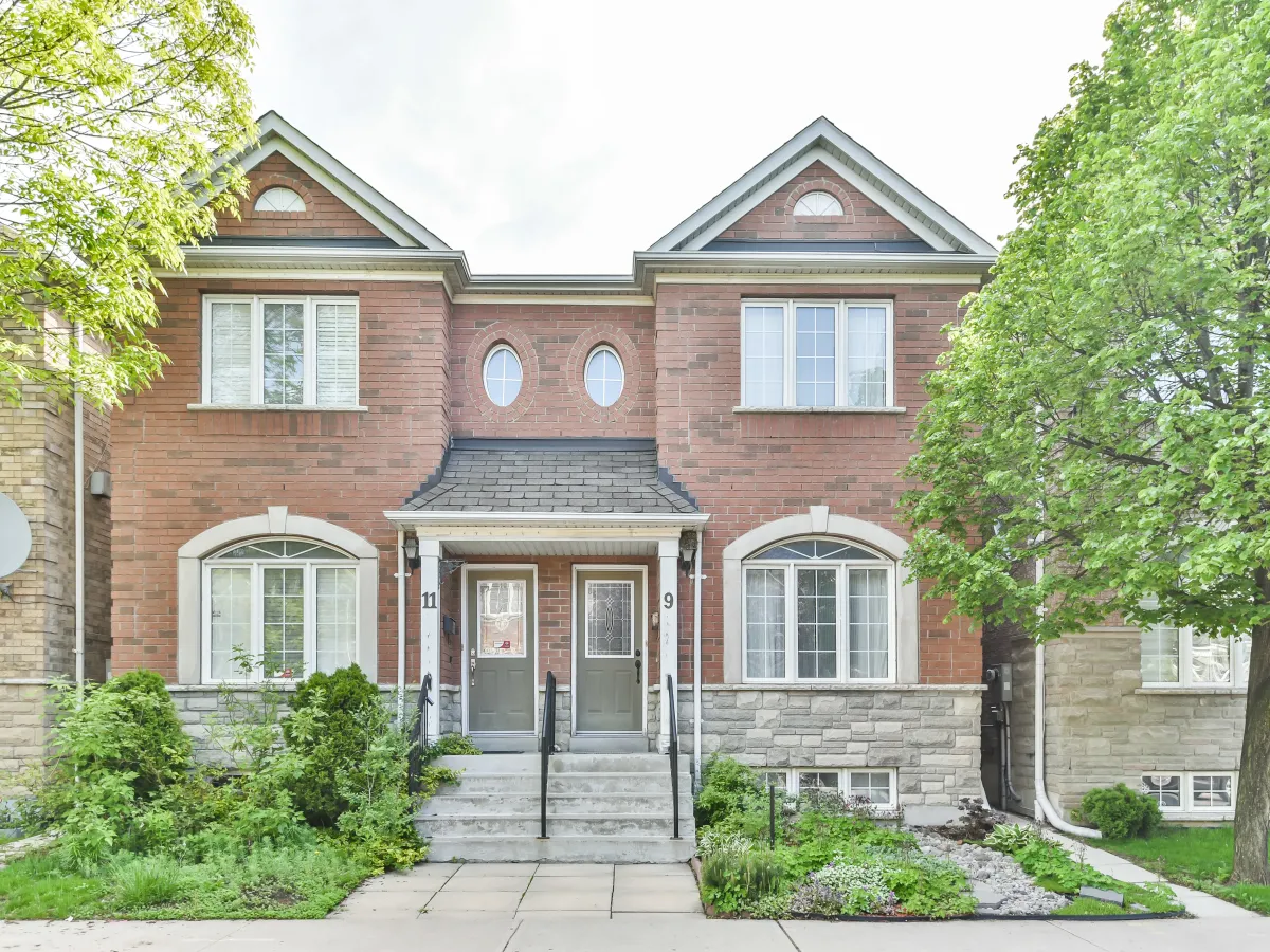 Bright and inviting living room at 9 Algarve Cres, featuring warm hardwood floors and an open-concept layout.