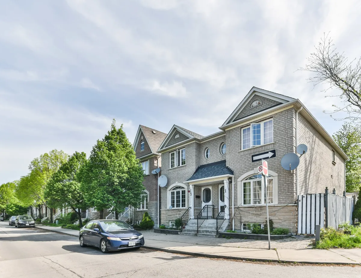 Exterior front view of 9 Algarve Cres, a beautiful 3-bedroom urban family retreat in Toronto’s Weston-Pellam Park.