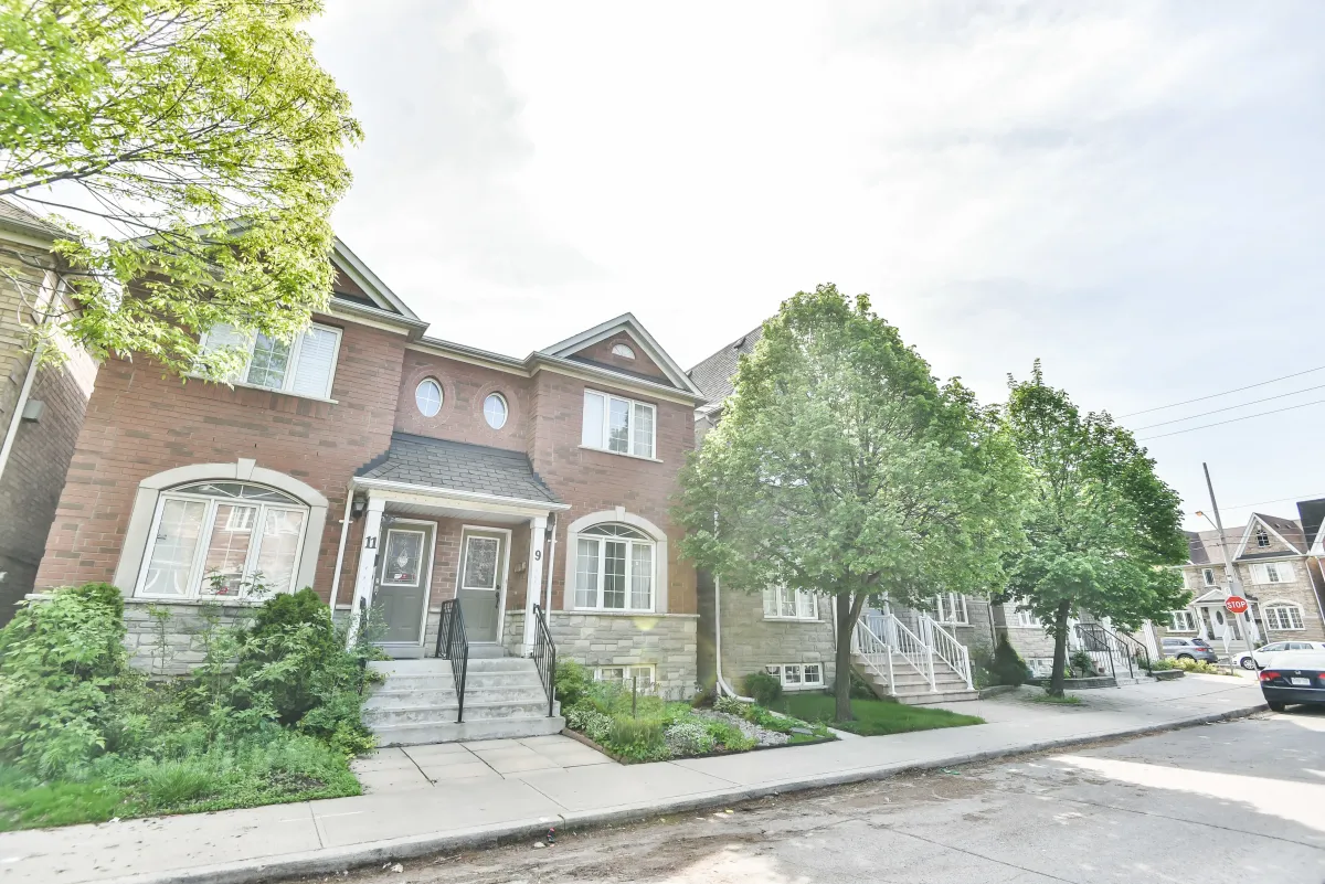Charming brick facade and landscaped front yard of the residential home at 9 Algarve Cres, Carleton Village.