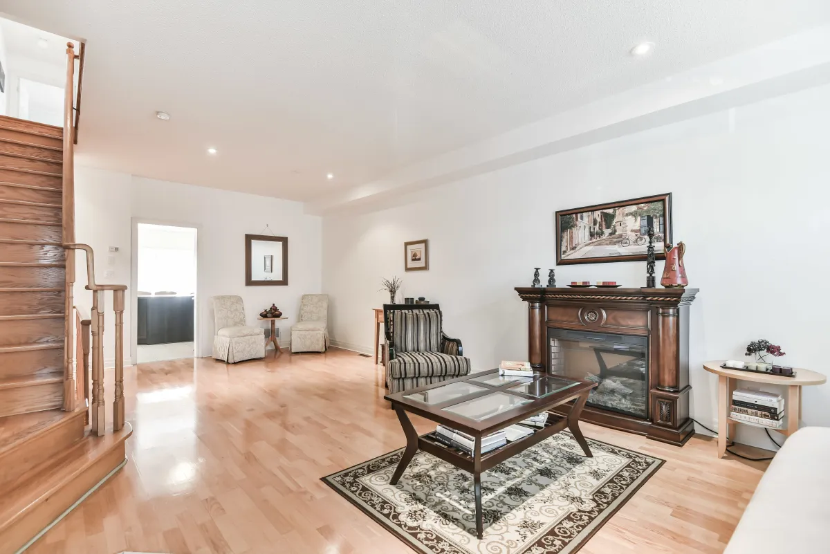 Spacious main floor living area at 9 Algarve Cres, highlighting the sophisticated comfort and natural light.