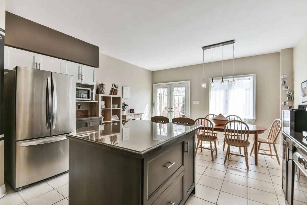 Gourmet kitchen at 9 Algarve Cres with stainless steel appliances and ample cabinetry for an entertainer's dream.