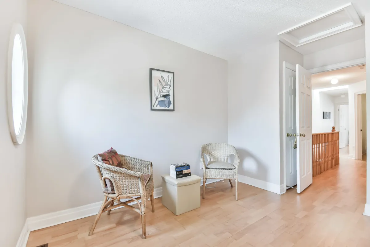 Airy bedroom at 9 Algarve Cres with neutral tones and plenty of natural light.