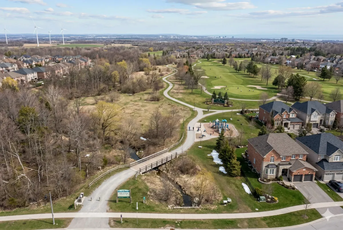 Future site of 90 single-family detached luxury homes by Millcroft Greens within the existing golf course community.