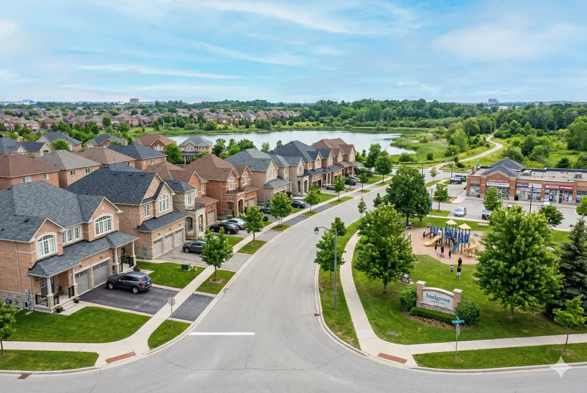 xecutive four-bedroom detached home in Snelgrove, Brampton, featuring a classic brick facade, double-car garage, and mature treed lot on a quiet crescent.