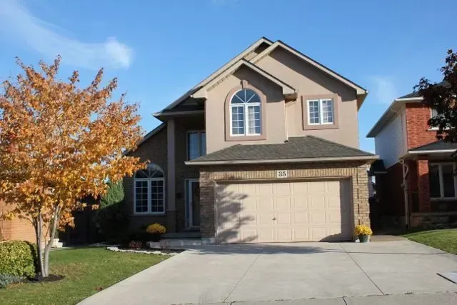 Suburban residential subdivision with modern detached homes in West Hamilton.