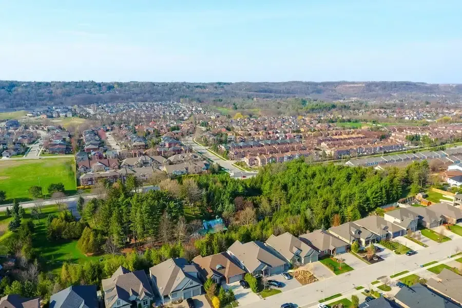 Aerial view of the lush greenery and residential neighborhoods in Dundas, Ontario.