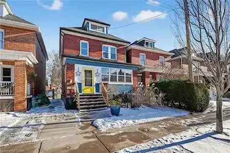 Classic brick detached houses in the East Mountain residential area of Hamilton.