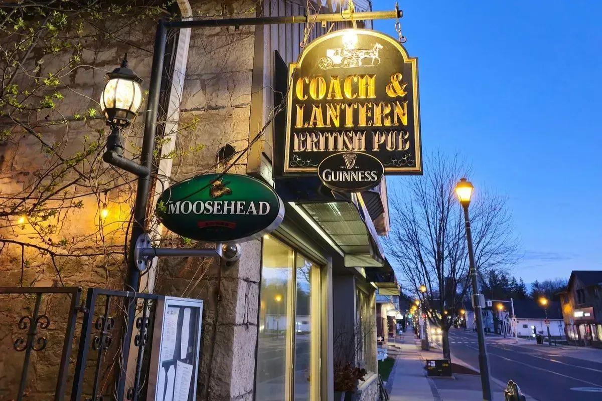 Modern exterior and string lights at Parma restaurant on James Street South.