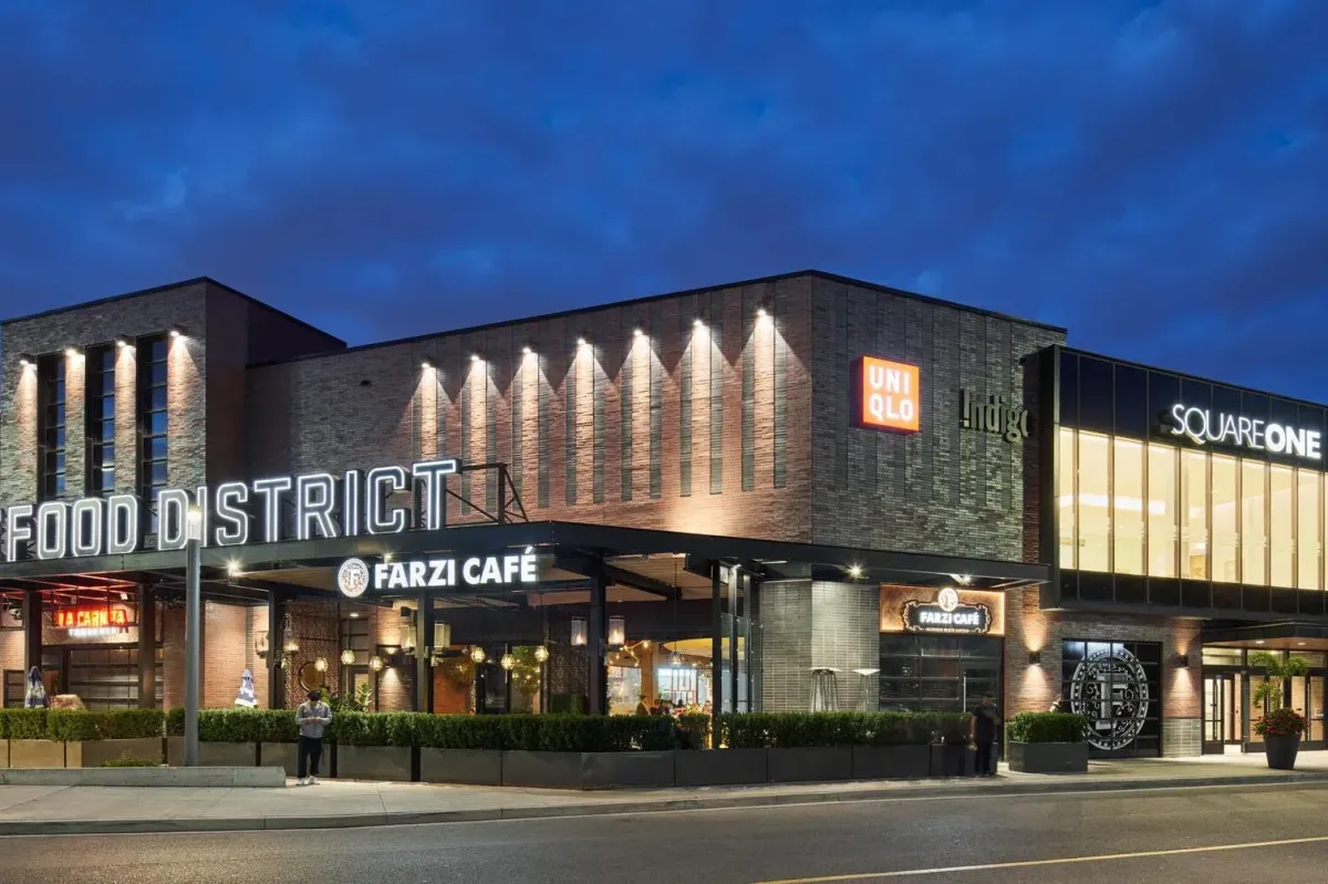 The illuminated exterior of the Food District at Square One Shopping Centre in Mississauga.