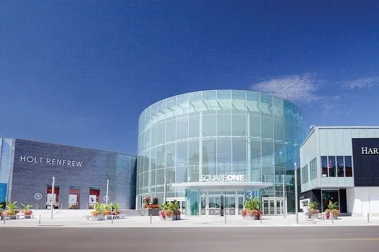 The modern glass exterior of Square One Shopping Centre in Mississauga.