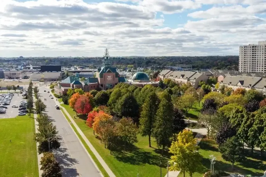 Tree-lined residential street and community view in Pickering during the fall.