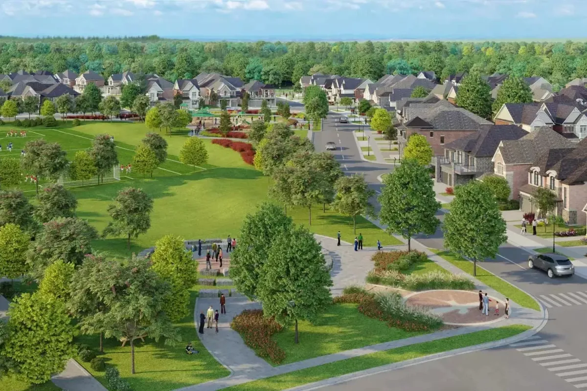 A green, family-friendly neighborhood and park area in a Pickering residential community.