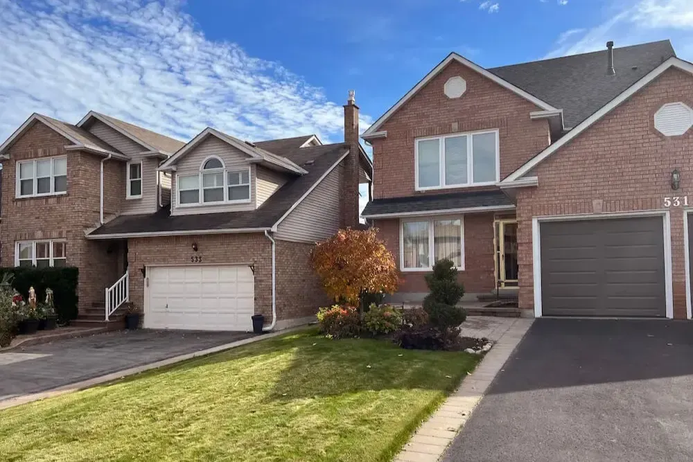 Exterior of a beautiful detached home near the Rouge Valley in Rougemount.
