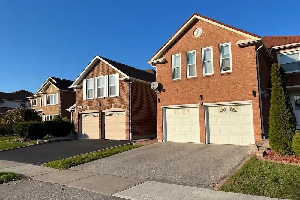 Established brick-exterior family homes on a quiet street in Brock Ridge, Pickering.