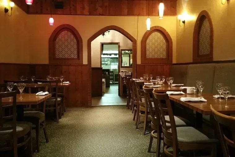 Warm and inviting interior dining room of The Grand Chalet and Tony Spiducci Ristorante.