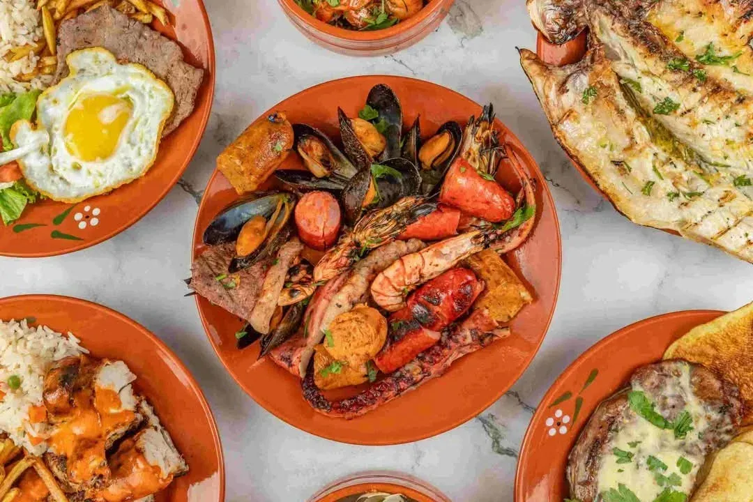 A spread of authentic Portuguese seafood and traditional dishes at Terra Mar restaurant.