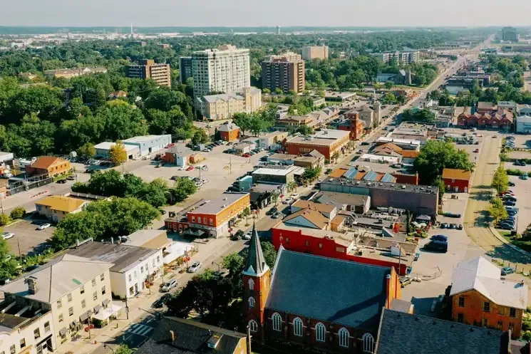 Aerial view of downtown Milton featuring local businesses and residential streets.