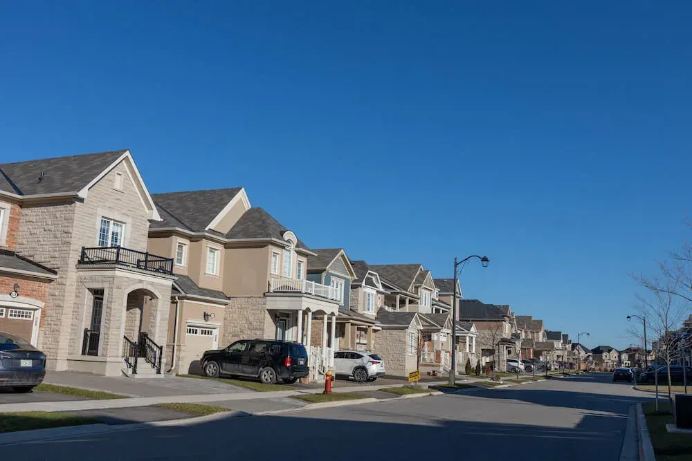 A line of contemporary detached houses in the popular Ford community.