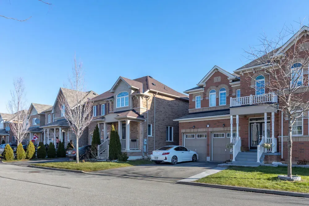 A peaceful residential street featuring family homes in the Scott neighborhood.