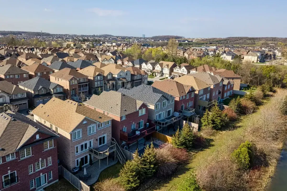 A row of modern detached family homes in a popular Richmond Hill residential area.
