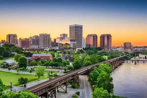 Panoramic sunset view of the Richmond Hill skyline and surrounding urban landscape.